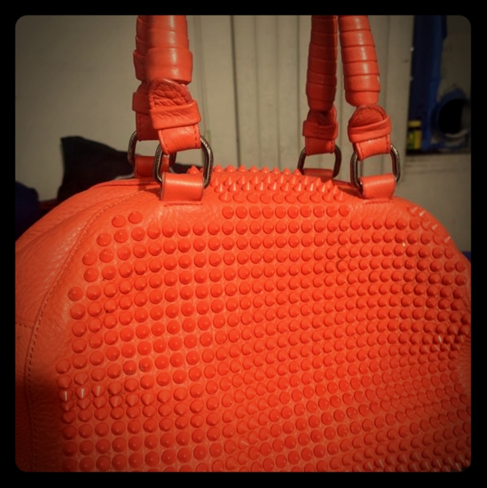 Christian Louboutin "red bottom" pallatone spiked